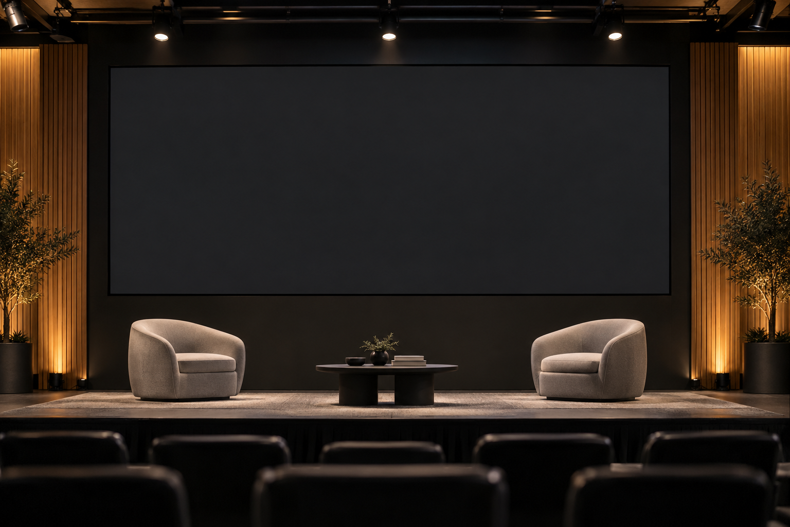 Imagined conference stage with lounge chairs and a large Osnara screen