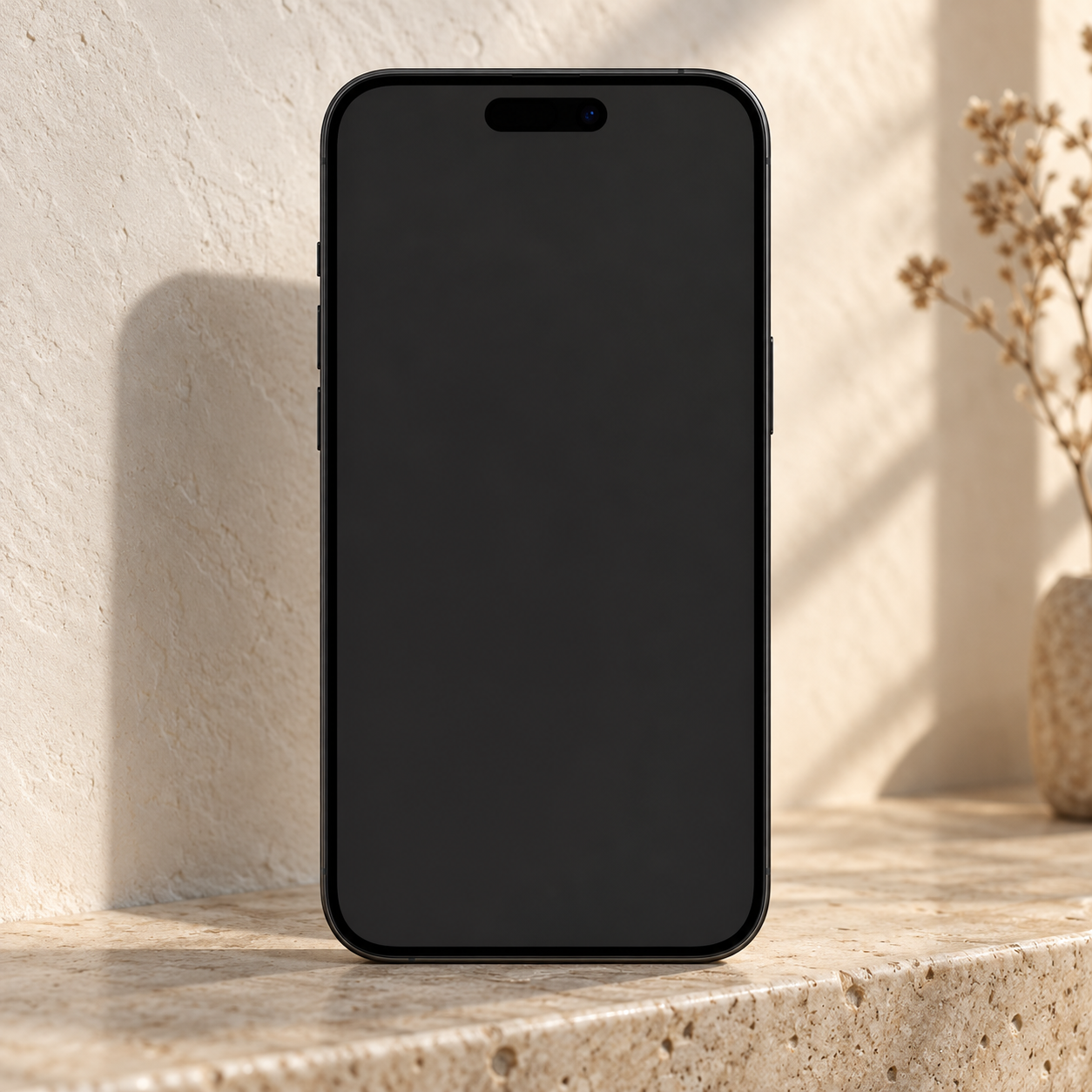 iPhone on a travertine ledge in warm daylight